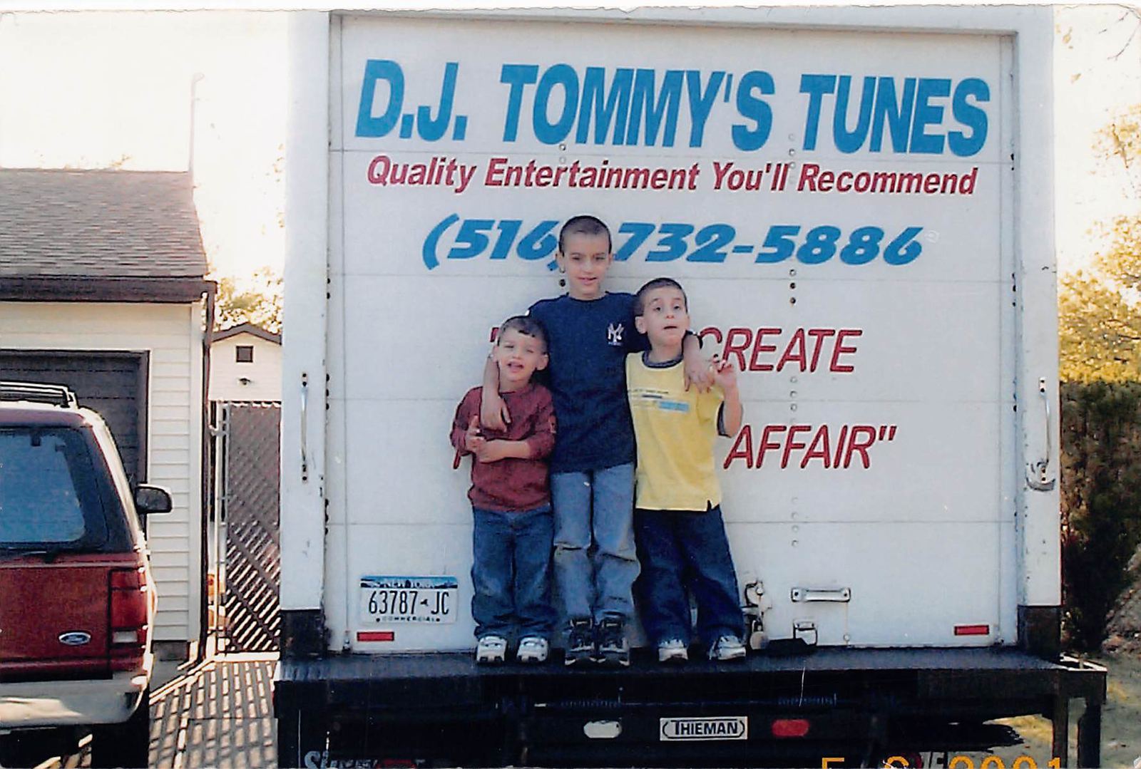 The Masino boys as kids on the back of the Tommy's Tunes box truck in 2001
