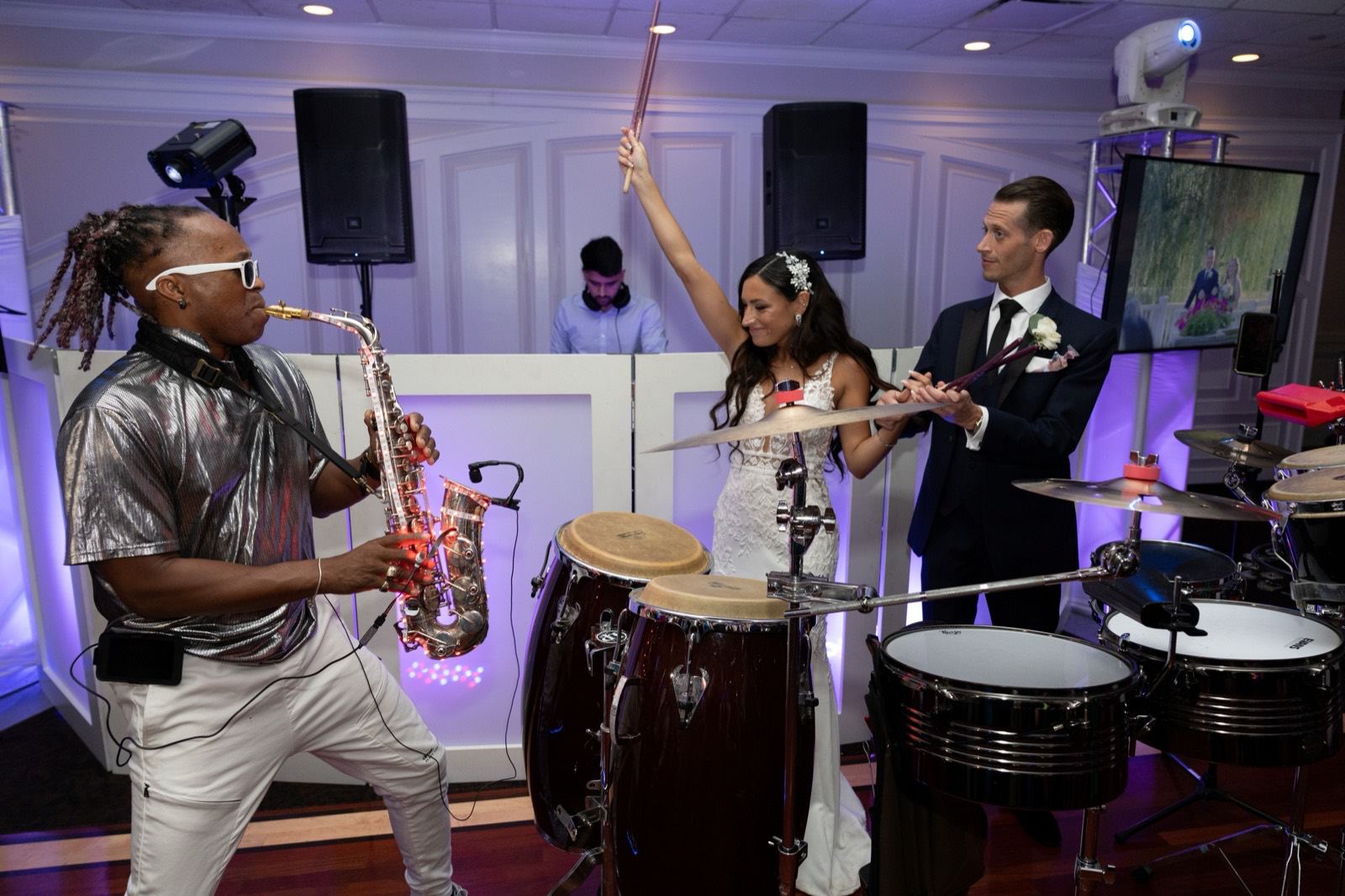 Curtis with the bride and groom