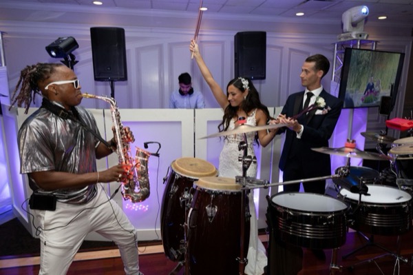 Curtis with the bride and groom